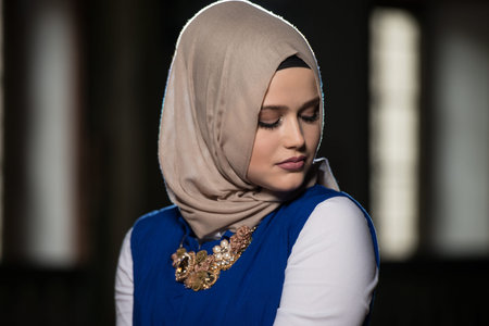 Young Muslim Woman Is Praying In The Mosque