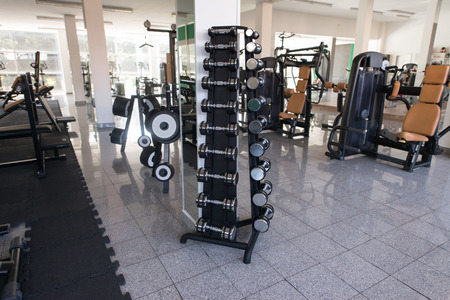 Modern Gym Room Fitness Center With Equipment And Machinesの写真素材