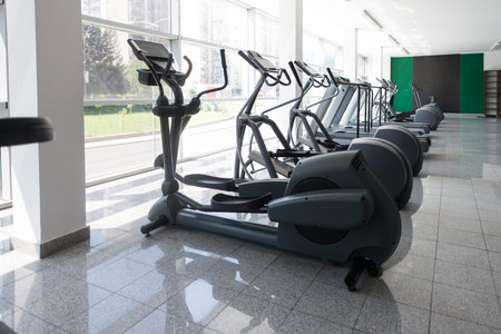 Modern Gym Room Fitness Center With Equipment And Machines