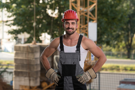 Portrait Of Handsome Male Architect Engineer With Red Helmetの写真素材
