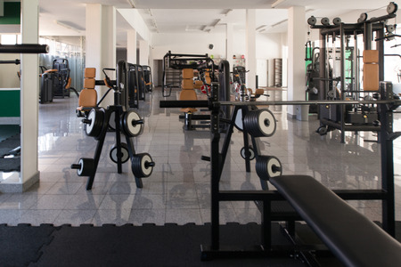 Modern Gym Room Fitness Center With Equipment And Machinesの写真素材