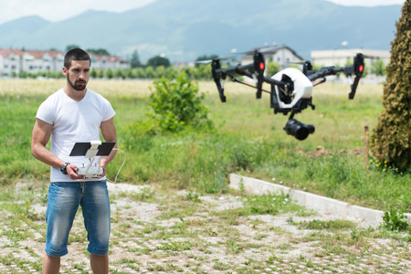 Remote Control for the Drone in the Hands of Manの写真素材