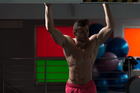 Handsome Good Looking And Attractive Young Man With Muscular Body Relaxing In Gym