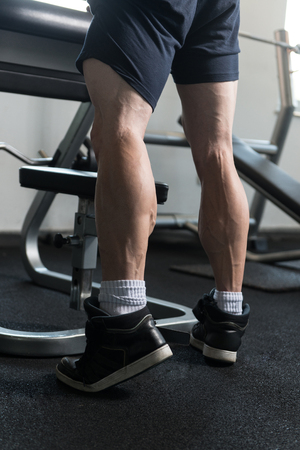 Bodybuilder Doing Heavy Weight Exercise For Legs Calvesの写真素材