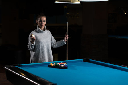 Portrait Of A Young Woman Concentration On Ball