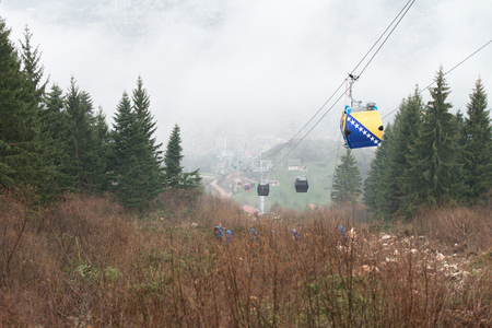 Trebevicka Zicara, Sarajevo, Bosnia and Herzegovina - April 05 2018: Exercise on Gondola Lift Car - Alpinist Is Rescue People From Gondola That Are Stuckの写真素材