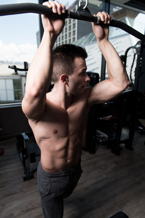 Handsome Good Looking And Attractive Young Man With Muscular Body Relaxing In Gym