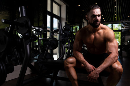Handsome Good Looking And Attractive Young Man With Muscular Body Relaxing In Gym