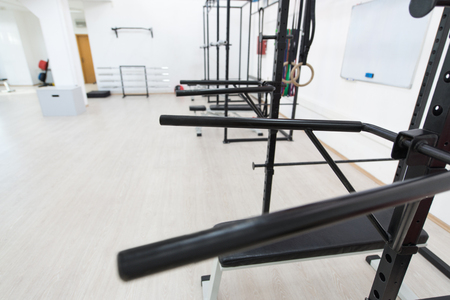 Modern Gym Room Fitness Center With Equipment And Machinesの写真素材
