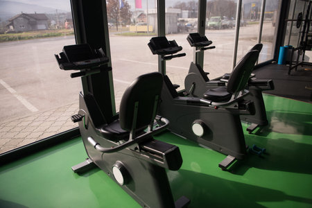 Modern Gym Room Fitness Center With Equipment And Machines
