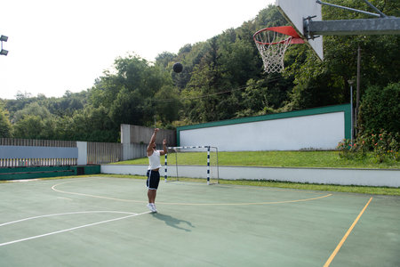 Basketball Player Bodybuilder Practicing And Posing For Basketball And Sports Athlete Concept