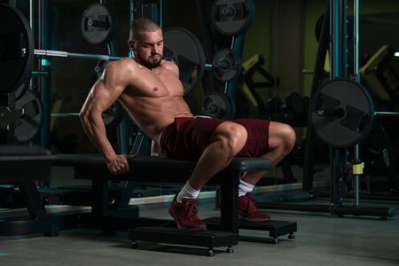 Handsome Good Looking And Attractive Young Man With Muscular Body Relaxing In Gymの写真素材