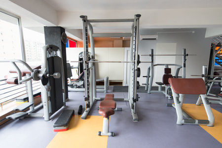 Equipment And Machines At The Modern Gym Room Fitness Center