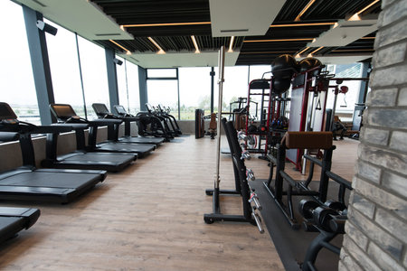 Modern Gym Room Fitness Center With Equipment And Machines