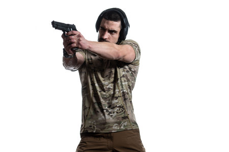 American Marine Corps Special Operations Modern Warfare Soldier With Fire Arm Weapon Ready for Battle on White Backgroundの写真素材