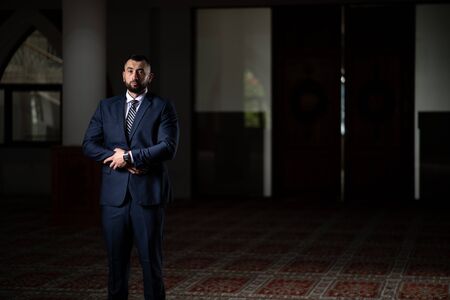 Businessman Muslim Making Traditional Prayer to God Allah in the Mosqueの写真素材