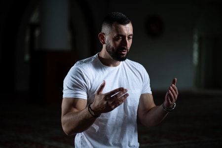 Muslim Man is Praying in the Mosque
