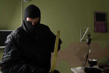 Man Wearing a Mask Robbed a Jewelry Store - Robbery Conceptの写真素材