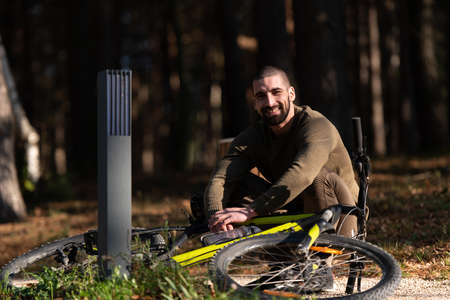 Mountain Biker Riding on Bike in Summer Mountains Forestの写真素材