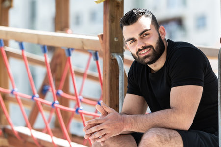 Portrait Of A Physically Fit Young Man Posing Outdoors