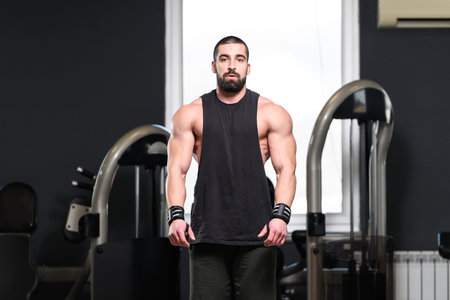 Portrait Of A Young Physically Fit Man Showing His Well Trained Body - Muscular Athletic Bodybuilder...