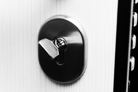 Modern Metal Key and Key Hole and Door - Very Sturdy Steel Doorの写真素材