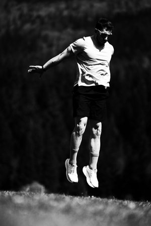 Athlete Practicing Vertical Jumps Surrounded By Natureâ€™s Beauty