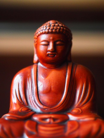 Beddha Lounge Red  Asian Statue Meditation Close Upの写真素材