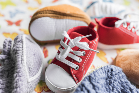 Baby sneakers, boots and bootiesの写真素材