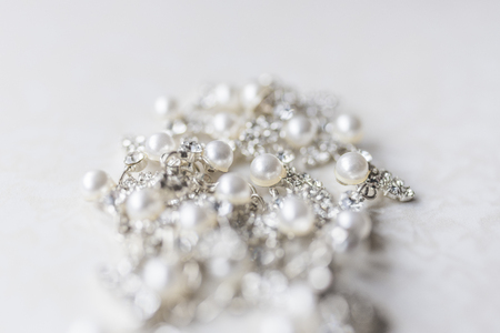 Pearl silver necklace on a white backgroundの写真素材