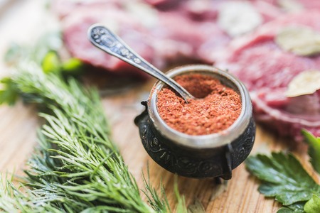 Pepper with spices, dill, parsley, fresh meatの写真素材