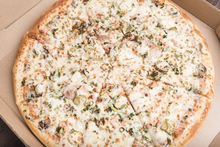 Pizza in a pizza boxの写真素材