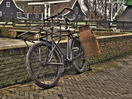 Bicycle with milk canisterの写真素材