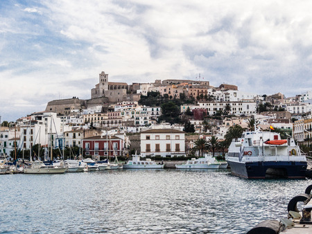 Port of Ibiza, in the background the old city.の写真素材