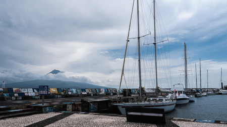 Horta harbor capital of Faial, Azores. In the background the island of Pico.の写真素材