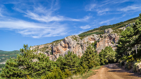 Hermitage Virgen de la Peña hung in the Sierra de Loarre, Huesca, Aragon, Spain.の写真素材
