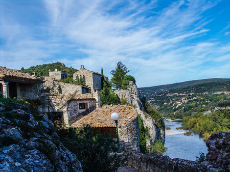 Town of Aigueze perched on the cliff overlooking the Ardeche at the end of its gorges, Franceの写真素材