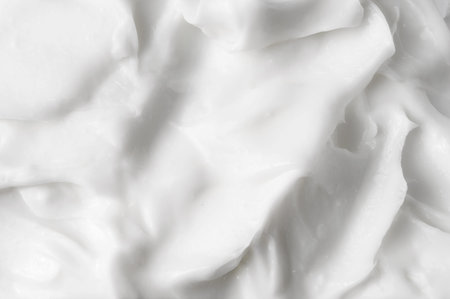 White texture of cosmetic body care cream background