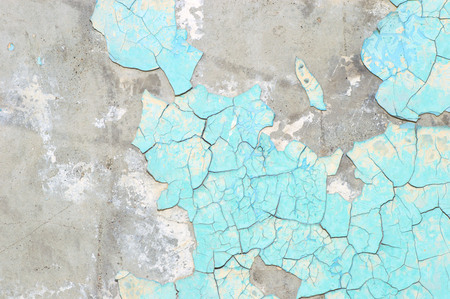 Peeling paint on wall blue grunge material textureの写真素材