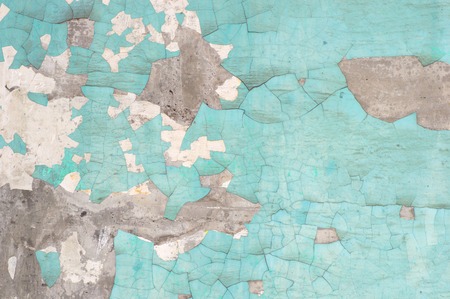 Peeling paint on wall blue grunge material textureの写真素材