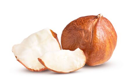 Closeup view of whole hazelnuts with half isolated on white backgroundの写真素材
