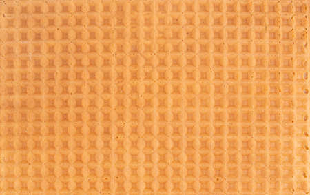 Tasty close up of yellow wafer background textureの写真素材