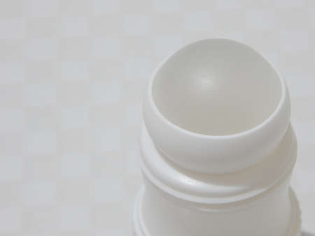 Antiperspirant deodorant roll-on for women or men. White background. Selective focus.の写真素材