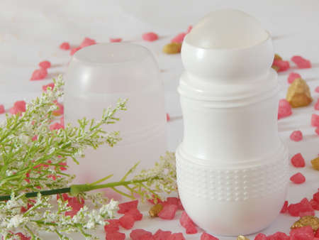 Antiperspirant deodorant roll-on for women or men. White background. Selective focus.の写真素材