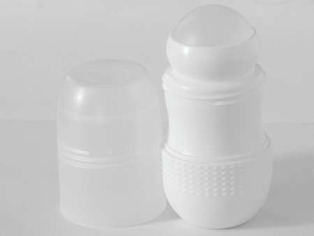Antiperspirant deodorant roll-on for women or men. White background. Selective focus.の写真素材