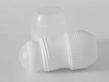 Antiperspirant deodorant roll-on for women or men. White background. Selective focus.の写真素材
