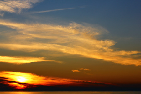 The sunset in the evening at the Baltic seaの写真素材