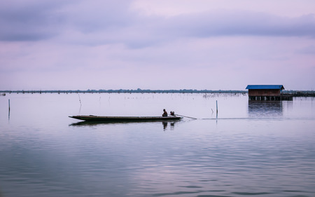 Gulf of Thailand long tailed boat southern of thailand floating on clear sea waterの写真素材