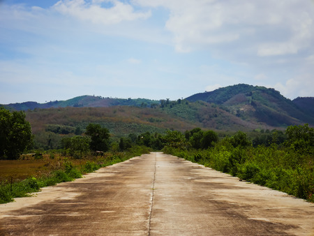 landscape with road and mountainsの写真素材