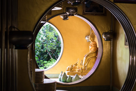 Golden Buddha statue in public temple at Thailand